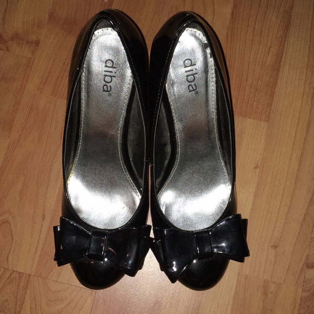 Diba “Trish Sha” Stacked Bow Black Pumps